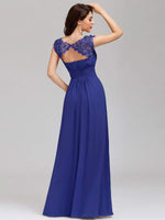 Back pose of woman in elegant sleeve lace and chiffon bridesmaid dress in sapphire