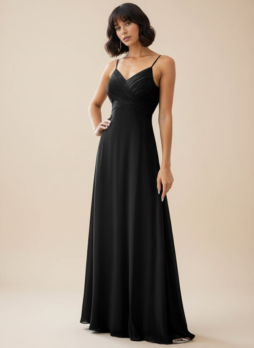 Malika cross front and cowl back bridesmaid dress in Black full front shot of lady in regular size dress at Bay Bridal