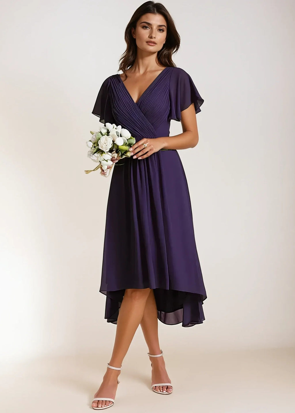 Jerry chiffon mother of the bride or groom dress NZ, front shot of lady wearing dark purple dress