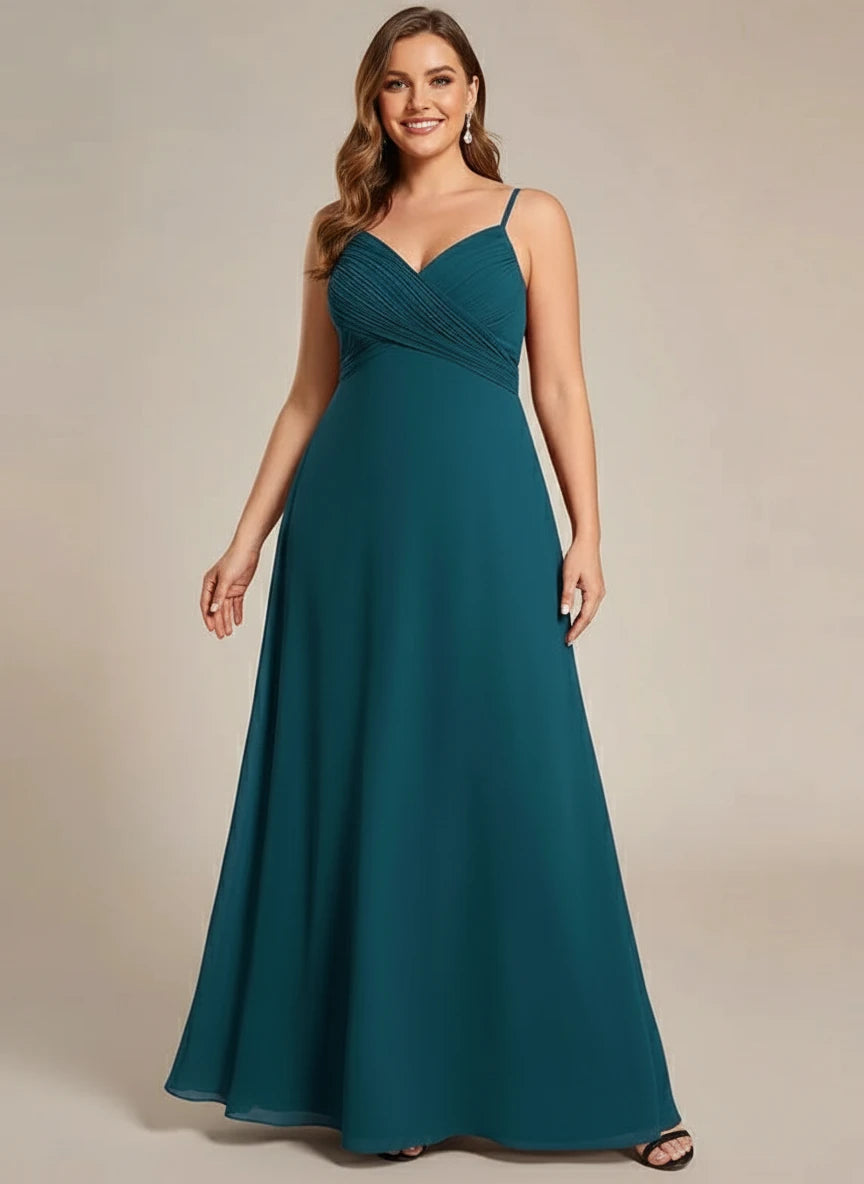 Malika chiffon cross front and cowl back bridesmaid dress in Teal full front shot of lady in plus size dress at Bay Bridal