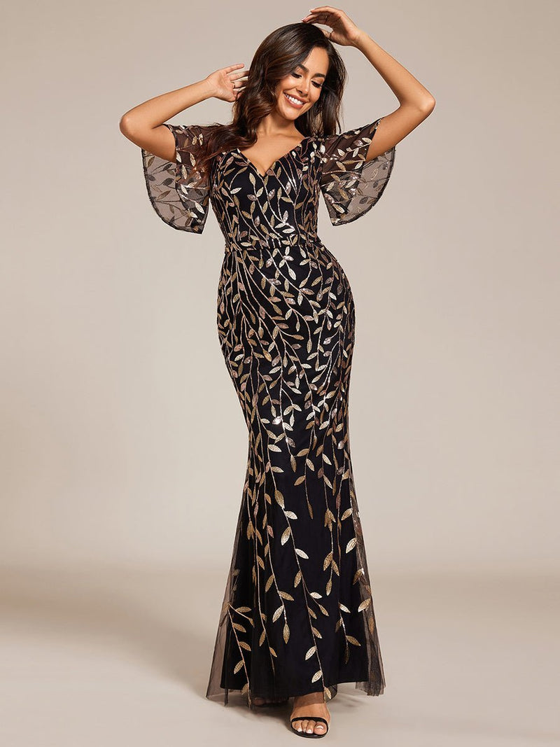 Eliza tulle sleeve black gown with gold leaf patterns Express NZ wide - Bay Bridal and Ball Gowns