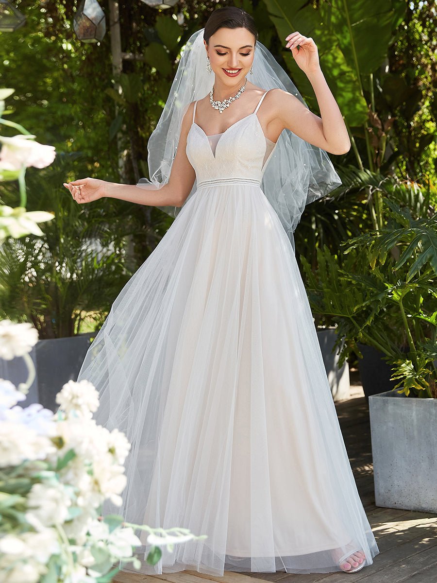 Milena thin strap nude and ivory wedding gown Express NZ wide - Bay Bridal and Ball Gowns