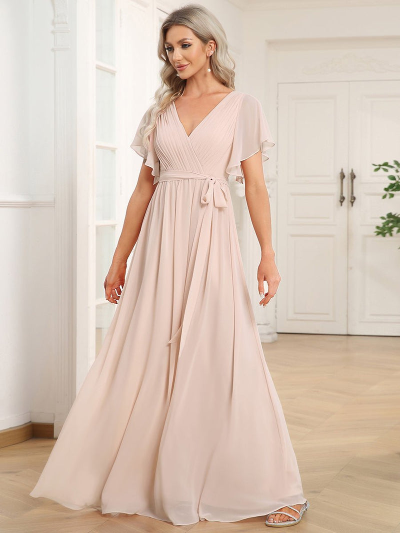 Reena Blush chiffon wedding dress with sleeve and waist tie - Bay Bridal and Ball Gowns