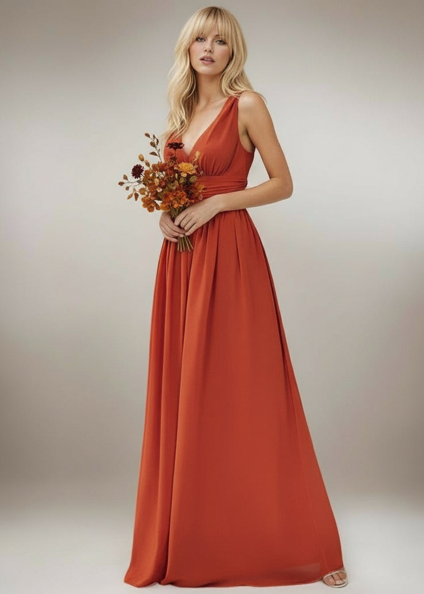 Classic Bridesmaid Dress in burnt orange. Full shot of young model wearing dress.