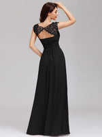 Back pose of woman in elegant sleeve lace and chiffon bridesmaid dress in black