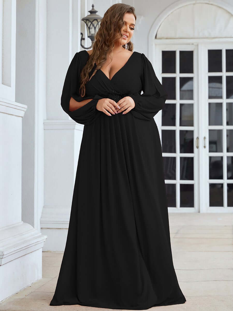 Cindy Evening Formal Ball Dress with Sleeve in Black. Front Shot of Woman wearing this bay bridal and ball gown dress.