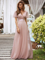 Alma flutter sleeve tulle bridesmaid gown in dusty pink Express NZ wide - Bay Bridal and Ball Gowns
