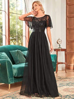 Georgia flutter sleeve evening dress in black s14 Express NZ wide - Bay Bridal and Ball Gowns