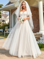 Gloria Ivory/nude tulle wedding gown with beading - Bay Bridal and Ball Gowns