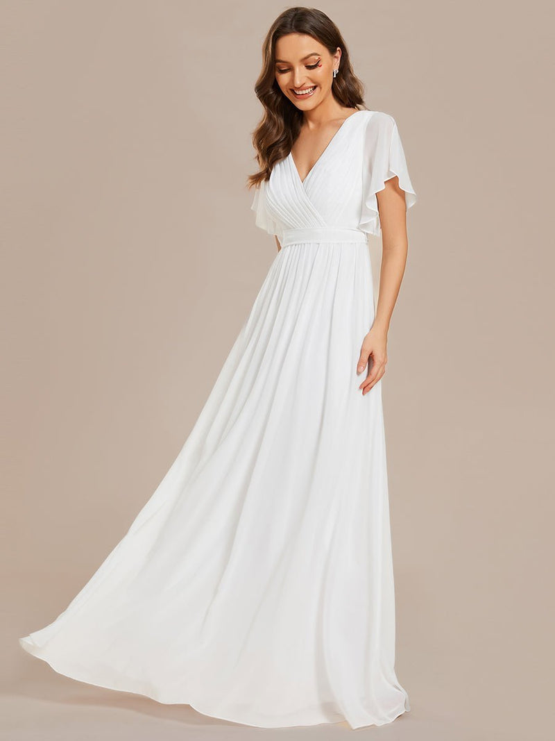 Reena Ivory chiffon wedding dress with sleeve and waist tie - Bay Bridal and Ball Gowns