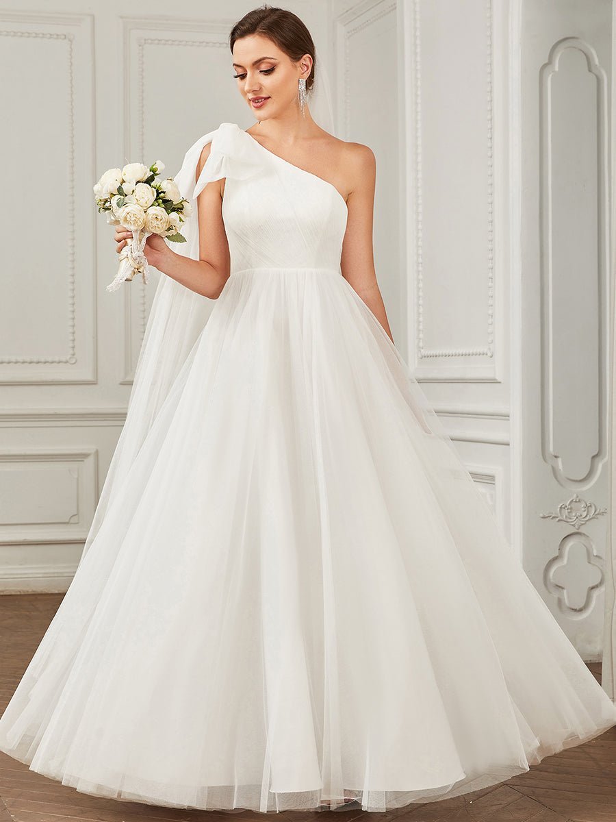 Sabina one shoulder ivory wedding gown with bow Express NZ wide - Bay Bridal and Ball Gowns