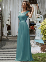 Sherrine round neckline bridesmaid dress in dusky blue Express NZ wide! - Bay Bridal and Ball Gowns