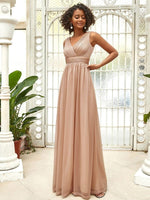 Tristy soft sparkling gown in champagne rose gold Express NZ wide - Bay Bridal and Ball Gowns